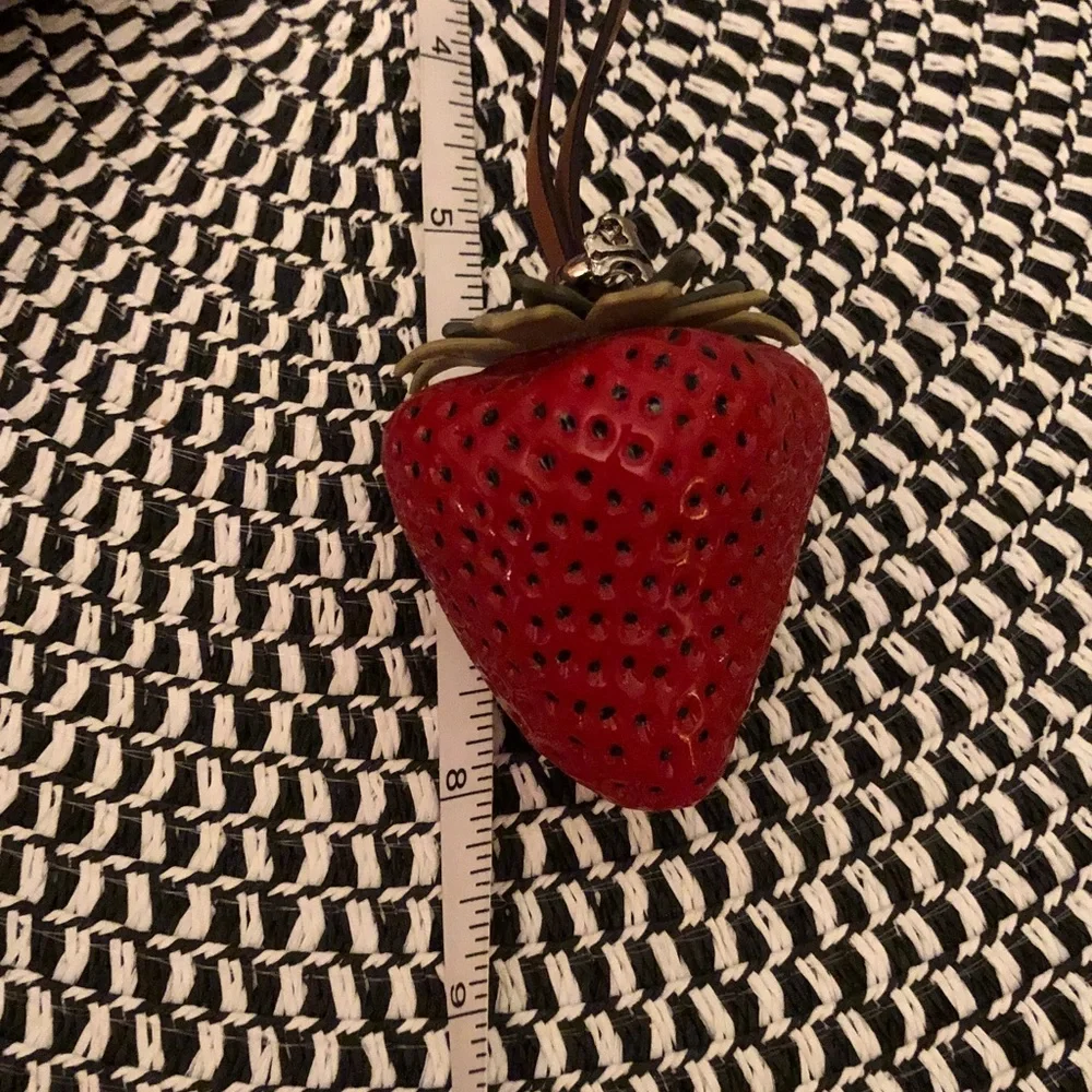 Authentic New with tag. Tory Burch Red Strawberry bag charm.